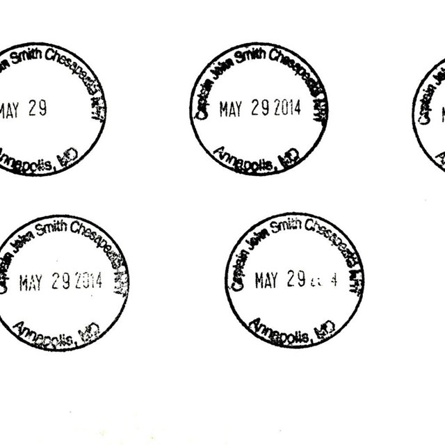 Paper stamped with the trail's passport cancellation stamp. 