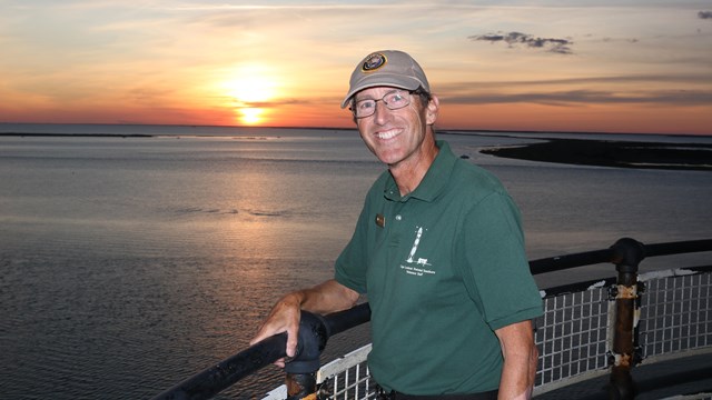 Visitors enjoy the view from the top of the lighthouse