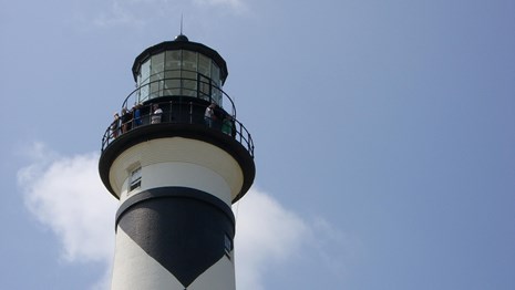 Visitors enjoy the view from the top of the lighthouse