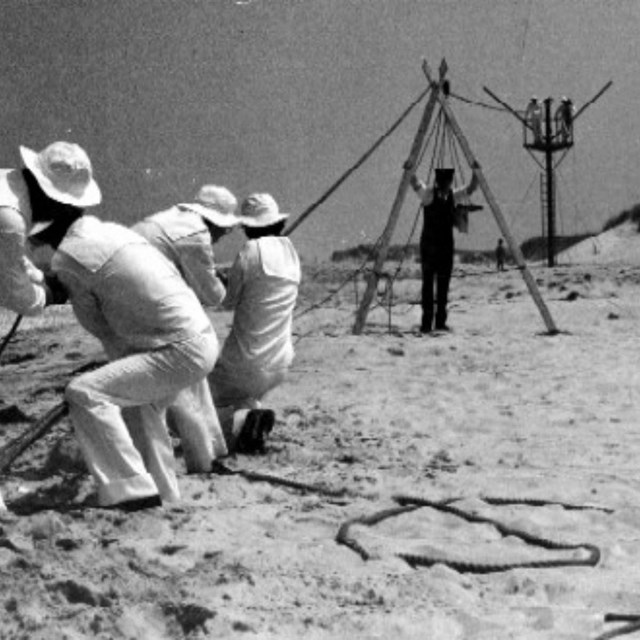 Surfmen practice a beach apparatus drill.