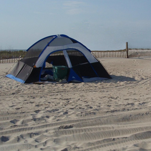 Tents on the sand.
