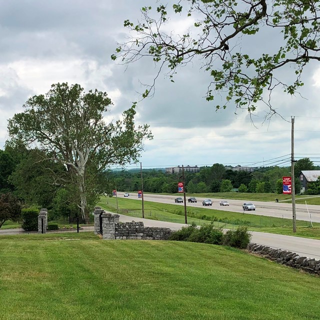 Cars on highway outside Camp Nelson gates