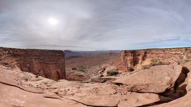 A panorama view with distant canyon walls