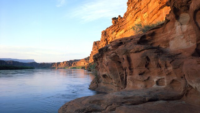 River running through a canyon at sunset