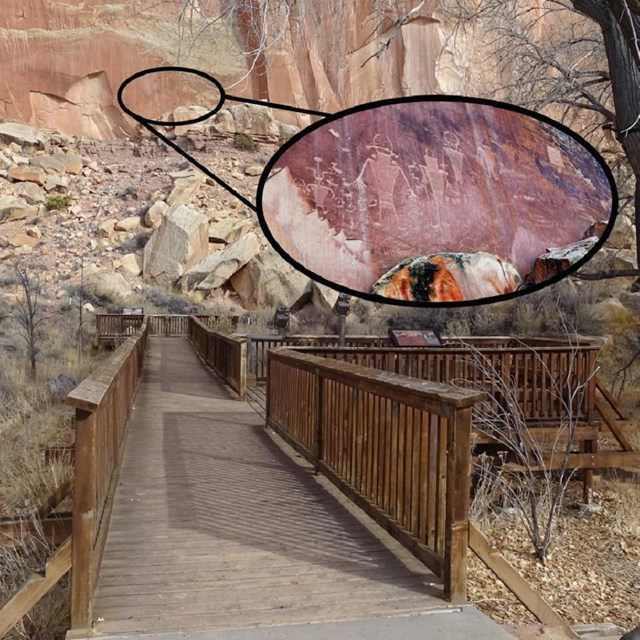 Wooden boardwalk facing a reddish rock wall, with a circle showing where the images ares.