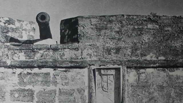  Black and white photo of US Army doors on the Fort