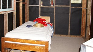A replica of farmworker housing in the exhibit hall