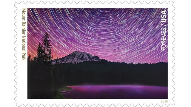 Stamp depicting night sky about Mount Rainier