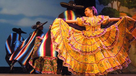 Ballet folklórico dancers onstage