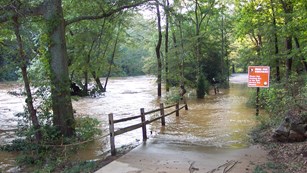 Flooded entrance road to Vickery Creek unit during the Flood of 2009.