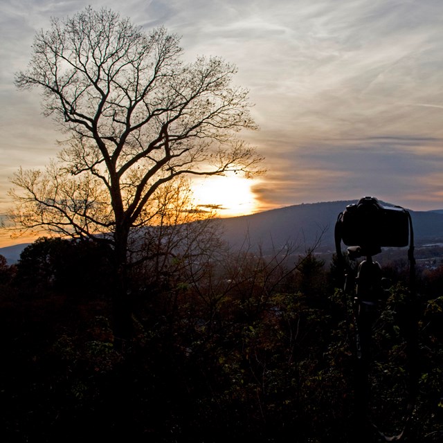 A camera films a sunset in Chattanooga
