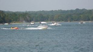 multiple boats on a lake