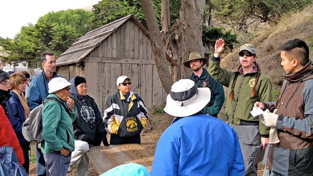 Volunteer leading hike for visitors.