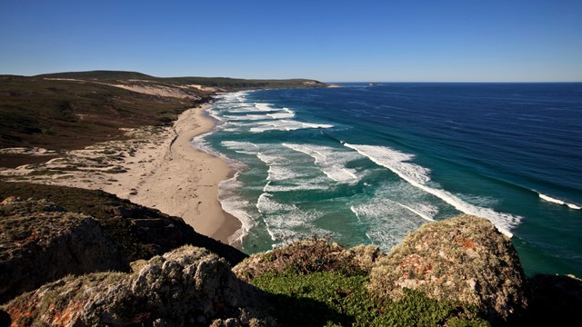 Coastline with white sand and waves. ©Tim Hauf, timhaufphotography.com