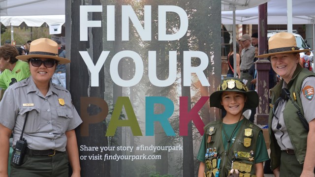 Junior ranger with national park rangers