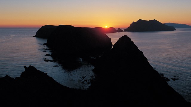 Chain of three islands at sunset. ©Tim Hauf, timhaufphotography.com