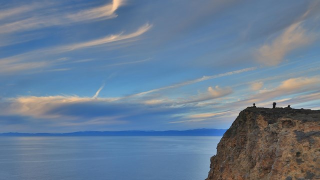 Coastal cliff at sunset with high clouds. ©Tim Hauf, timhaufphotography.com