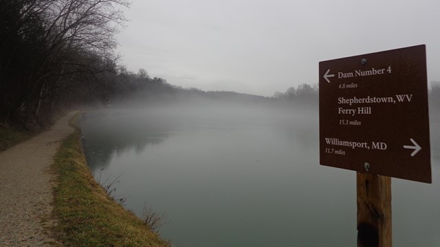 The Potomac River flowing calmly on a misty day. 