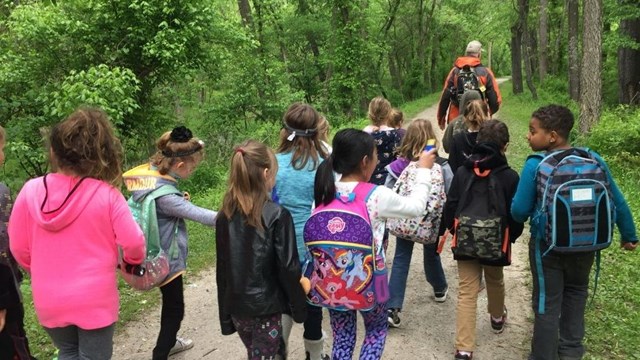 Youth on walking on the towpath.