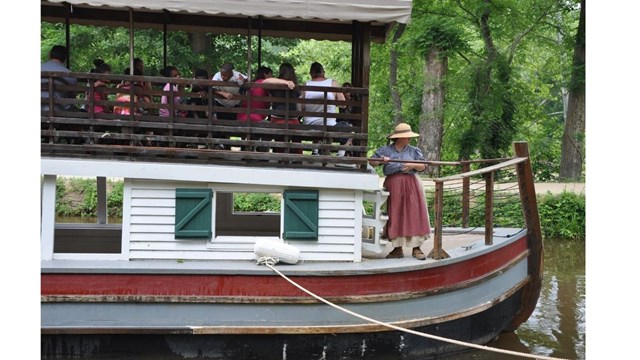 Youth experiencing a canal boat ride.