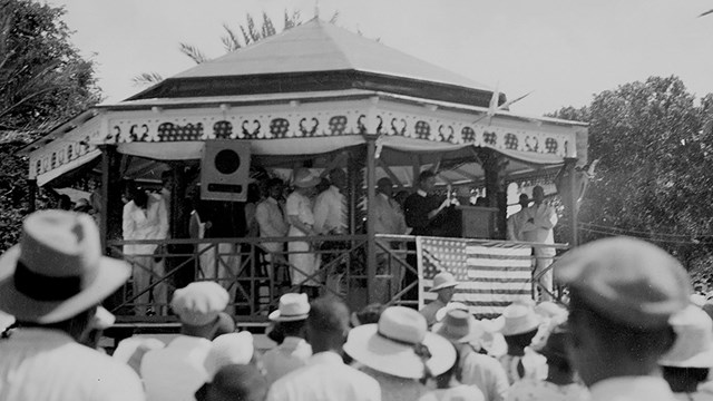 Black and white historic photo of a rally at the gazebo bandstand, 1940s