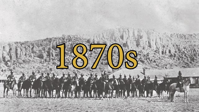 Black and white photo of African American cavalry soldiers in formation