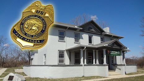 Park building and NPS law enforcement badge