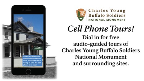 A picture of a house with a cell phone over top of it