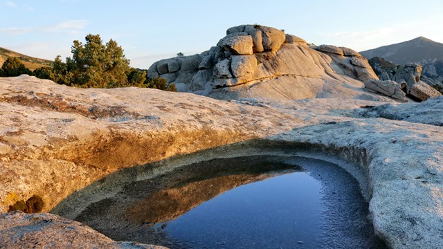 Panhole in a granite formation in City of Rocks National Reserve.