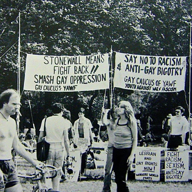 B&W photo of protest and banner
