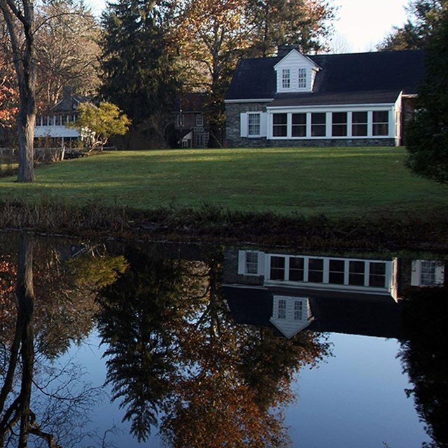 a cottage on a lake