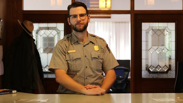 Ranger standing at desk