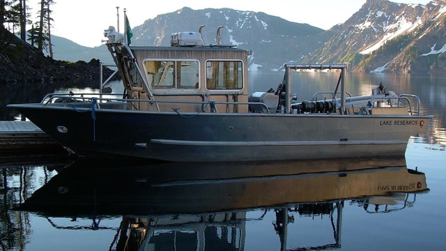 Research boat docked on Wizard Island at Crater Lake