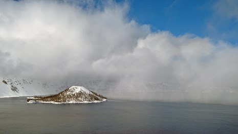 Clouds move across the surface of Crater Lake.