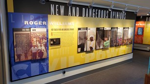 Roger Williams exhibit on long interior wall