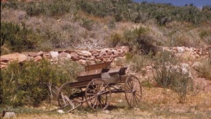 Wagon next to a desert hill