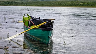 Canoe filled with equipment