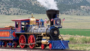 Steam engine on a railroad track