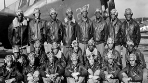 Black and white photo of uniformed airmen