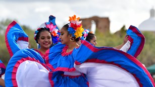 Folklorico dancers near mission ruins