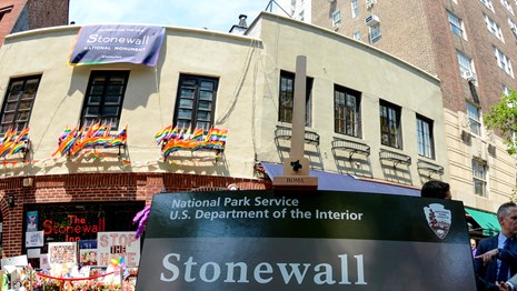 Stonewall National Monument banner in front of the Stonewall Inn