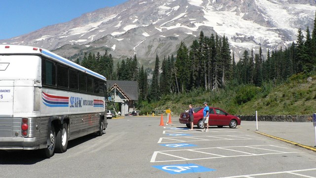 A tour bus in a parking lot
