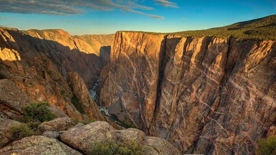 The sun sets on the Painted Wall at Black Canyon of the Gunnison National Park.