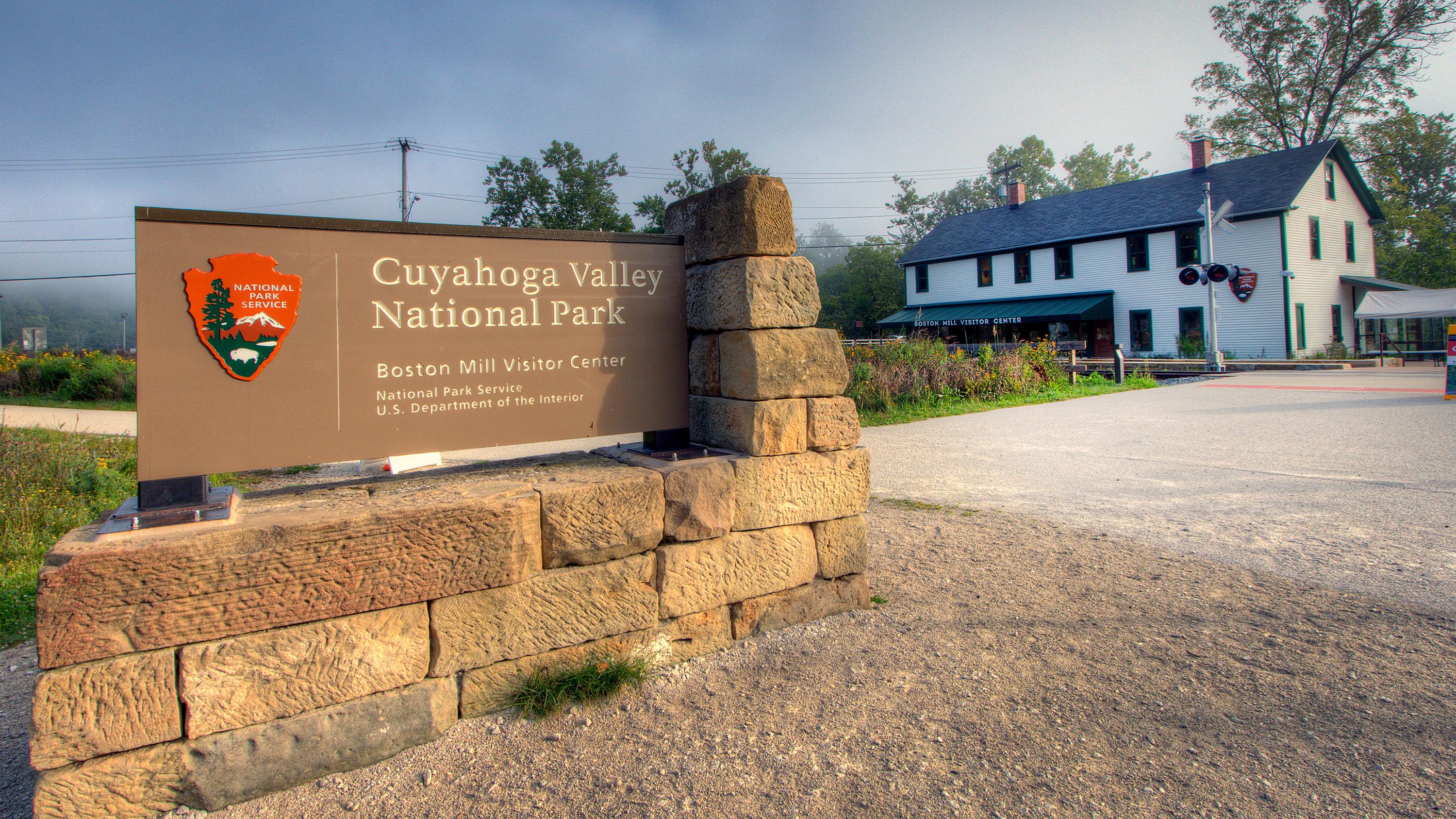 Sign outside a white, 2-story building reads &ldquo;Cuyahoga Valley National Park&rdquo;.
