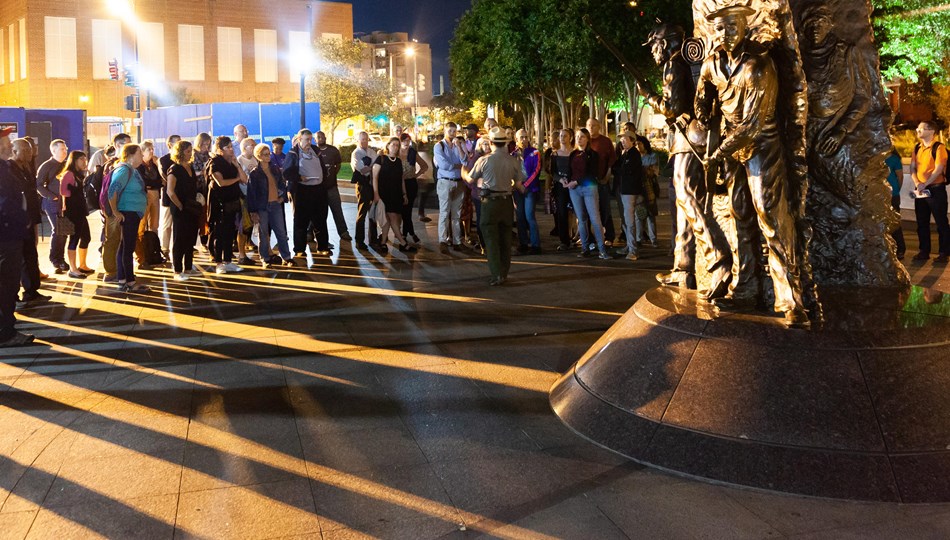 Park Ranger giving a tour to visitors at the African American Civil War Memorial, September 2018.