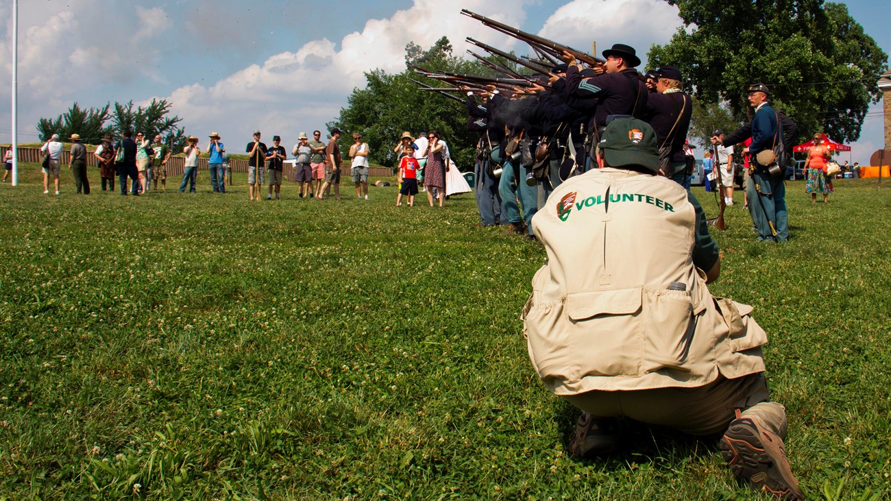 A volunteer helps capture photos at the Fort Stevens 150th Civil War Anniversary event. 