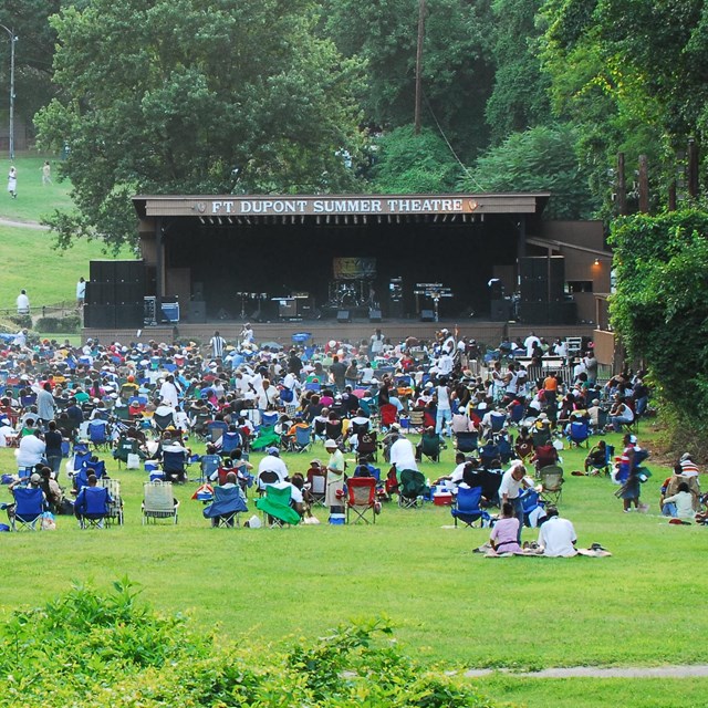 A crowd watching the Fort Dupont Summer Concert Series 