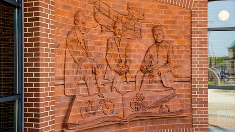 Brick facade entrance of the WDIC