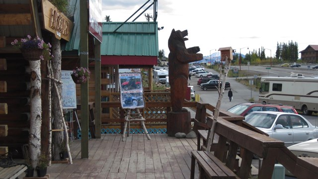 a view of business along a boardwalk