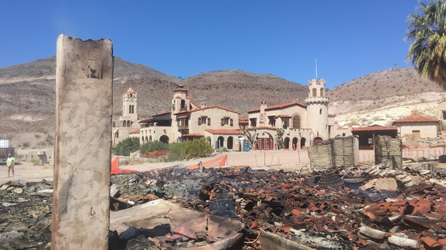 a spanish style building with damage